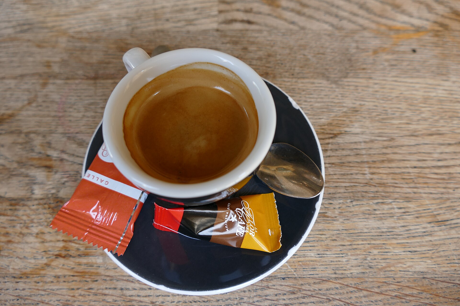 Cup of espresso on a saucer at an Italian bar