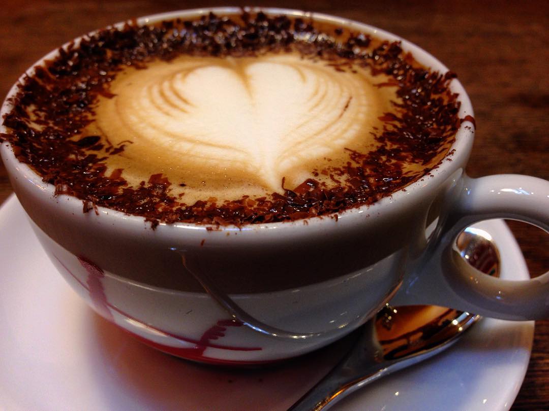 Marocchino coffee with espresso, milk foam and cocoa powder in a small cup