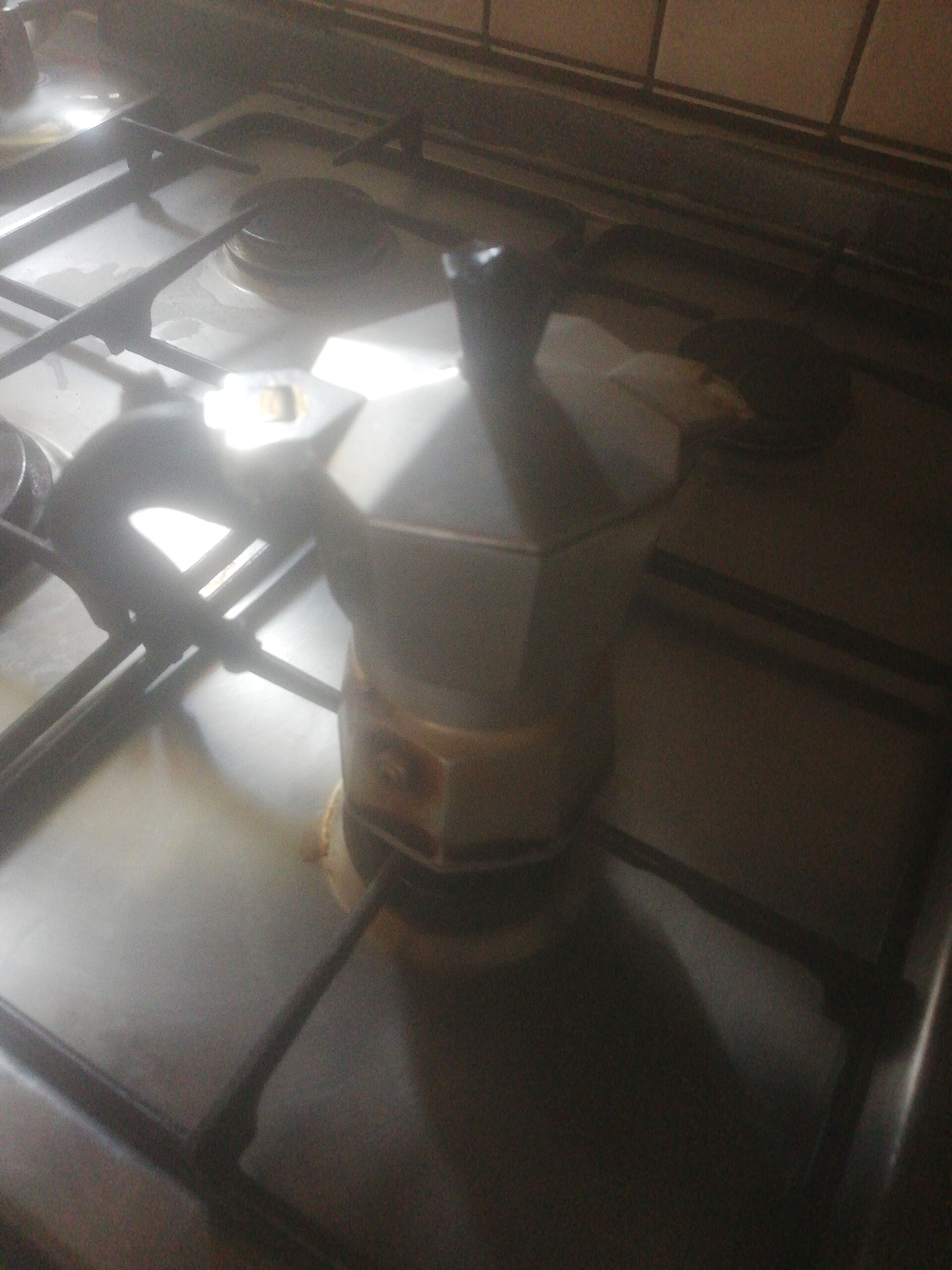 A classic aluminum moka pot, the kind that needs gentle cleaning