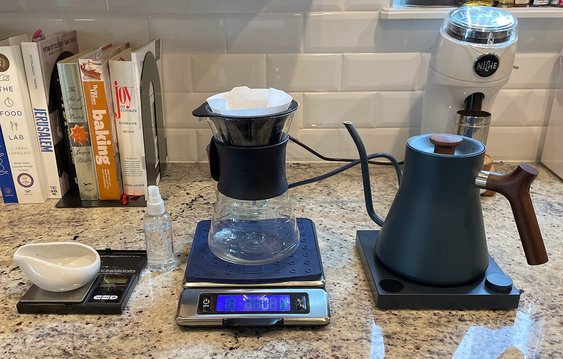 Pour over setup where the best coffee scale sits under the brewer