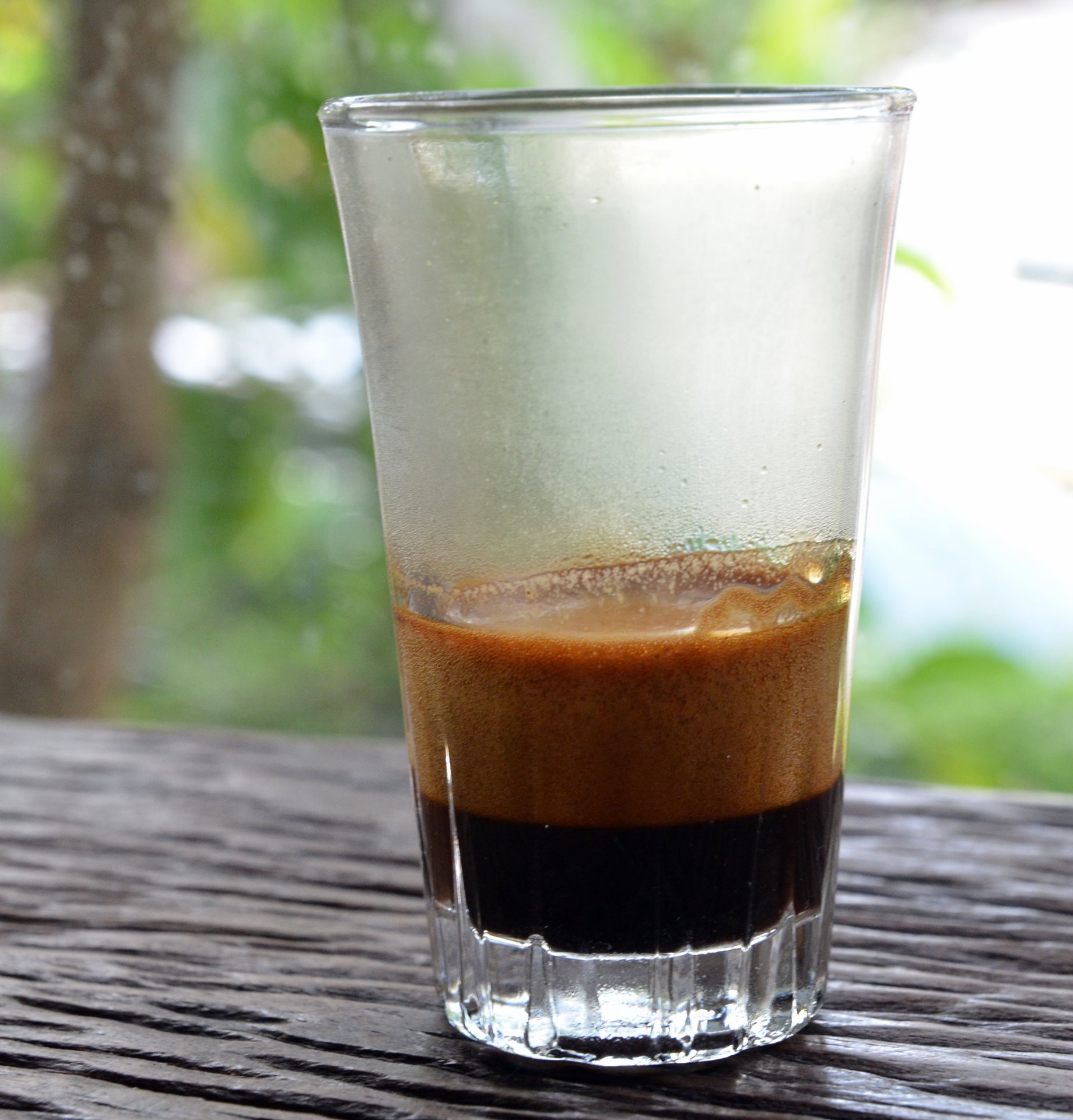 Espresso with thick crema in a small cup, the goal when you dial in espresso