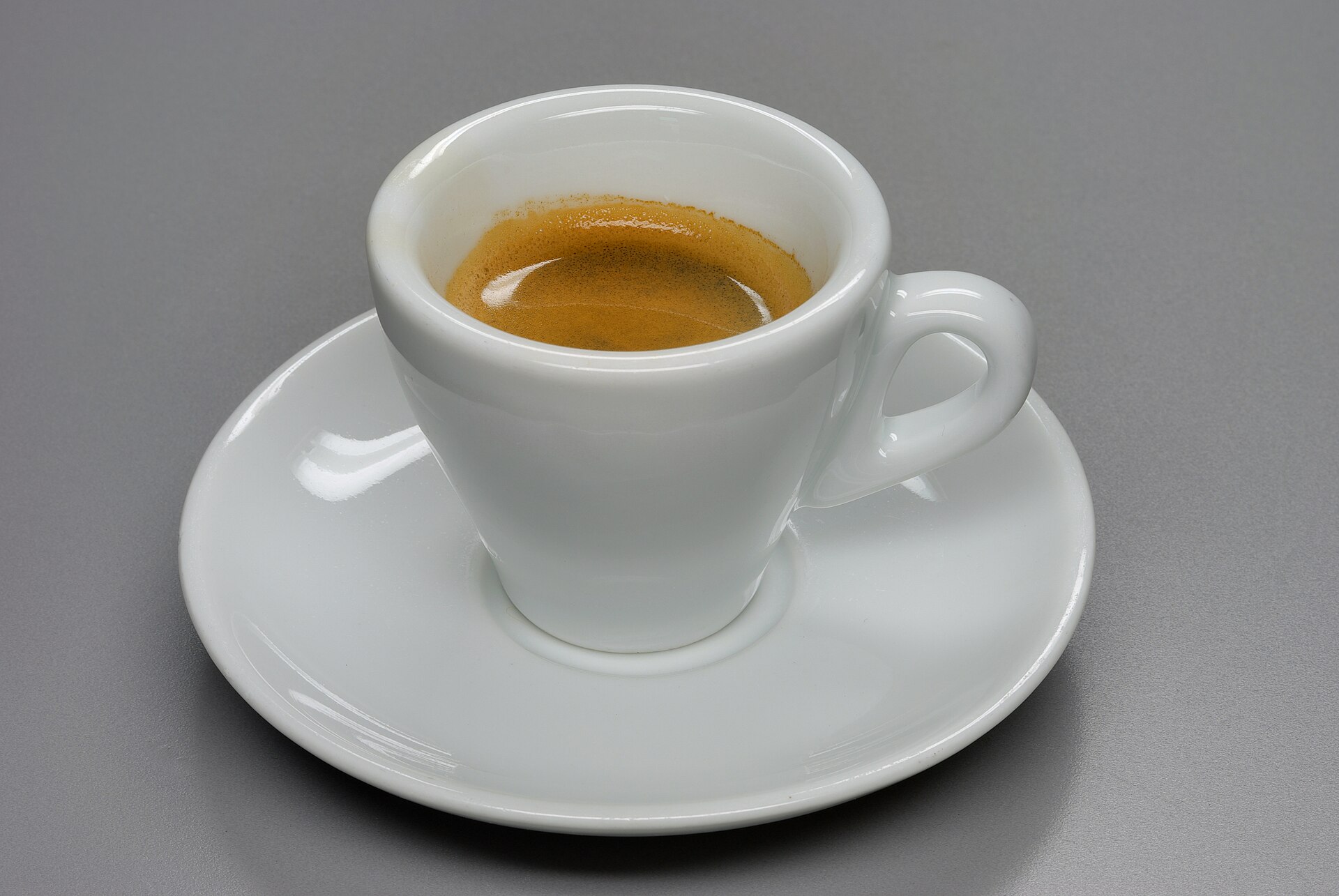 Black and white photo of an espresso, the modern descendant of the Pope Clement coffee story