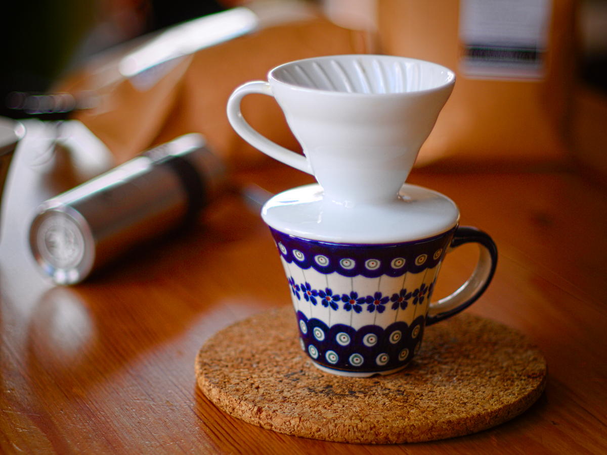 Hario V60 dripper on a table, a classic pour-over cone