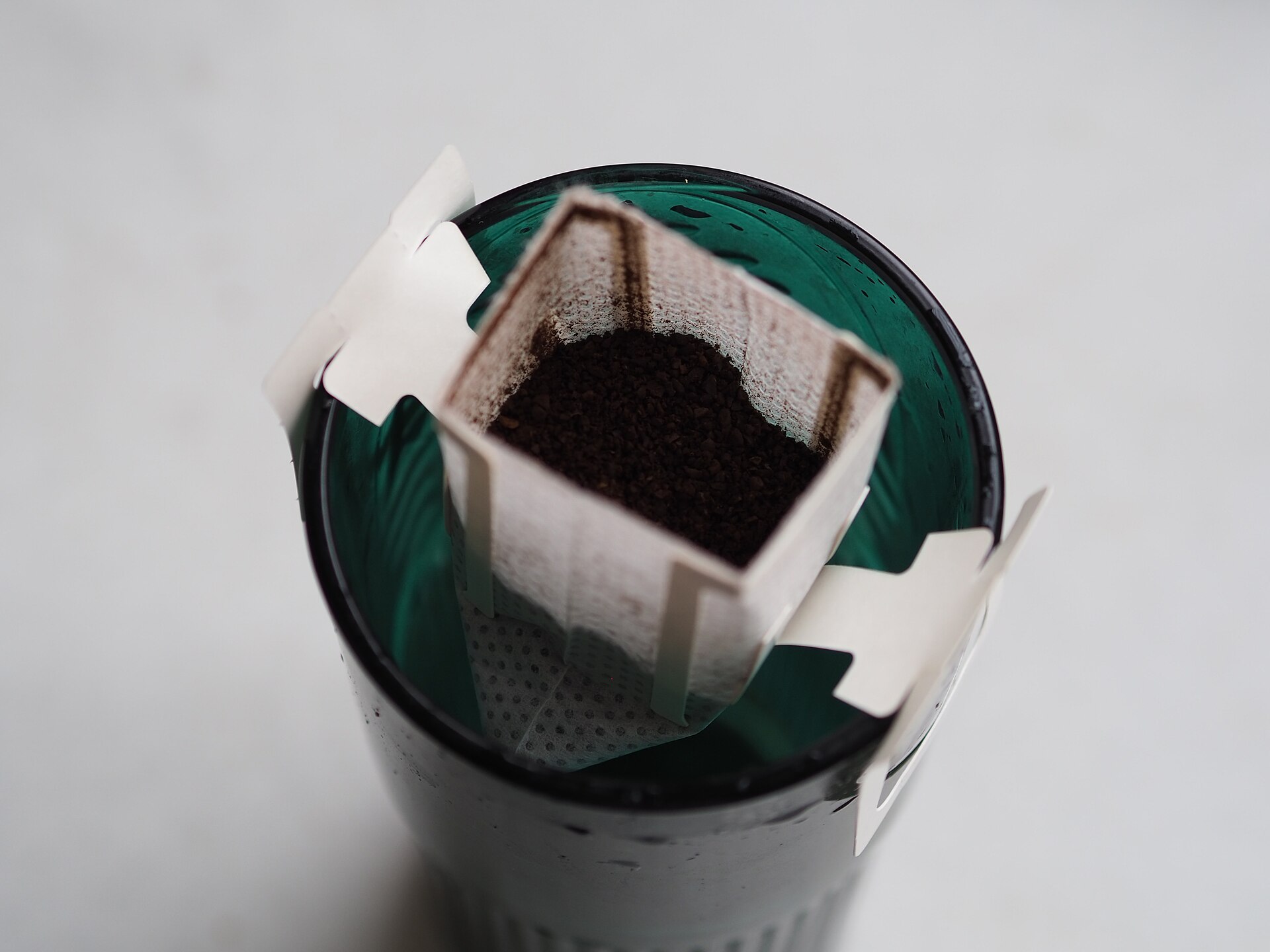Ground coffee in a paper filter before the pour, ready for one of the best gooseneck kettles