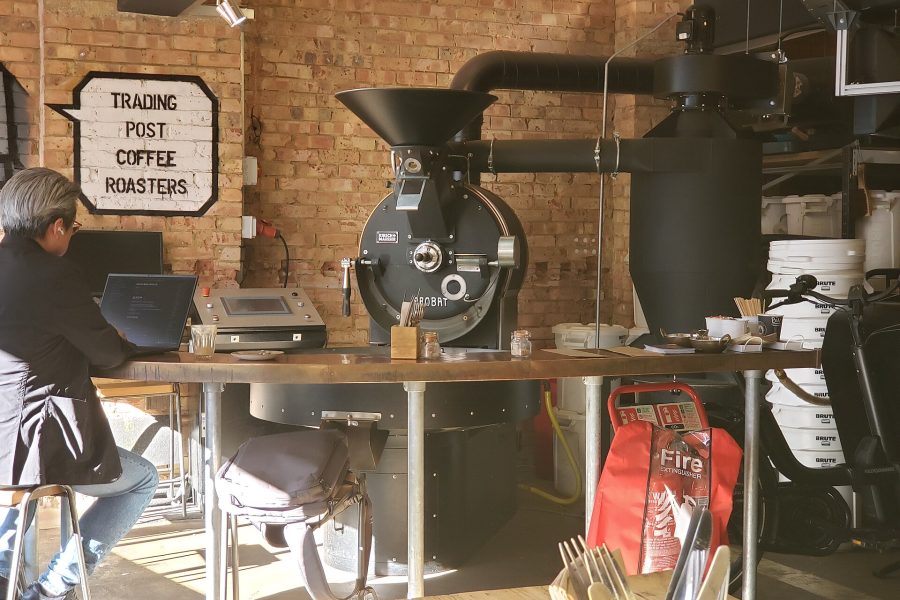 A traditional drum coffee roaster in an independent roastery, where beans start coffee degassing