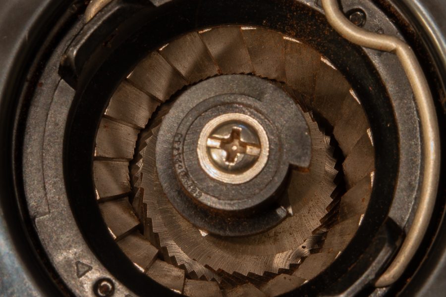 Close-up of a conical burr set, the heart of any hand grinder like the Timemore C3