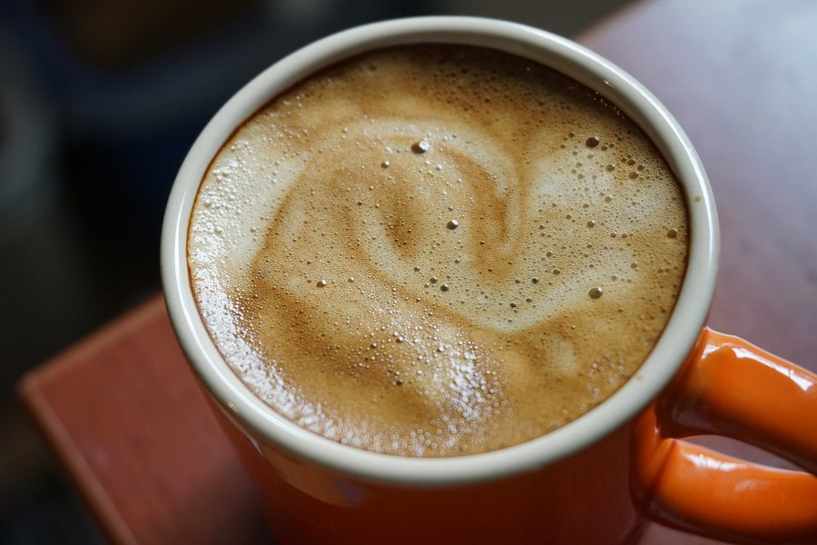 Swirls of espresso crema on the surface of an espresso