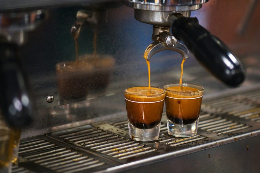 Two espresso shots being extracted from an espresso machine