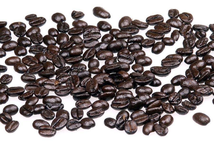 Rwandan coffee beans on a plain white background