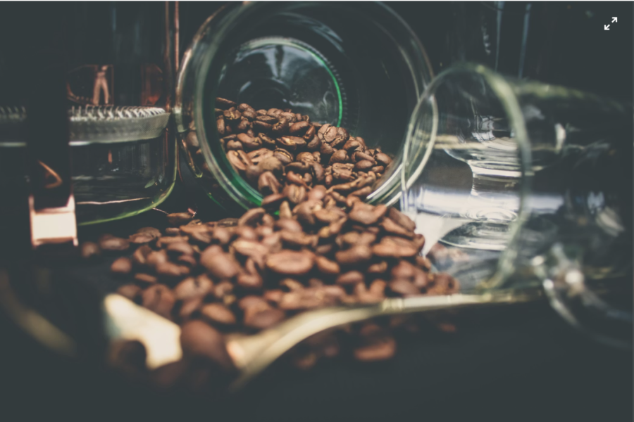 Glass jar for storing whole bean coffee away from moisture and light