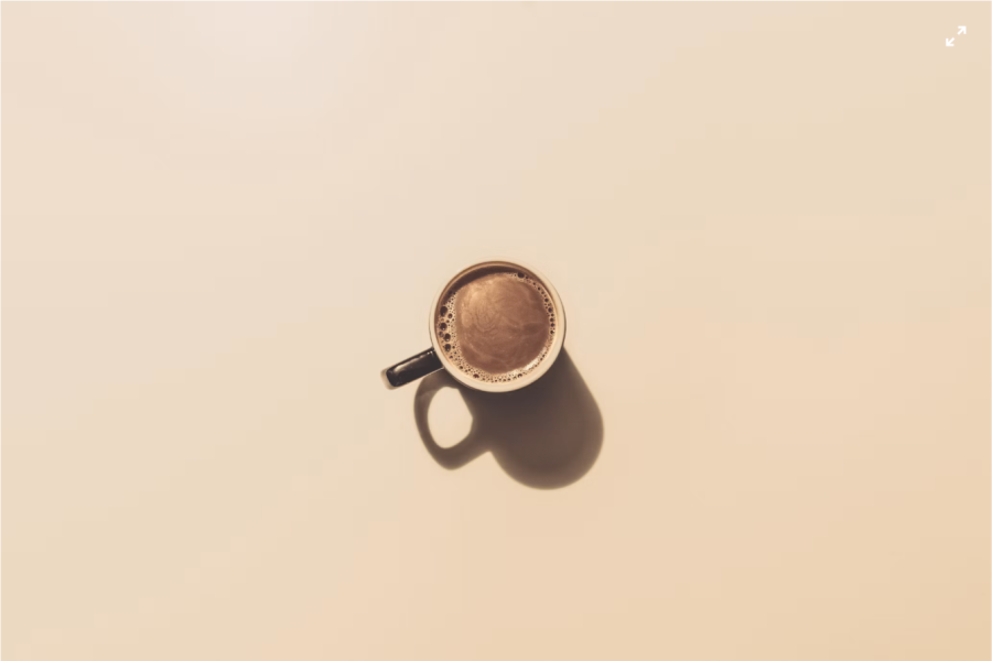A hot cup of coffee seen from above, everyone metabolizes caffeine differently